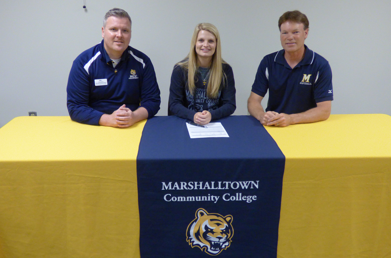 Rieley Rodman is joined by MCC volleyball coach Chris Brees, left, and MCC softball coach Rick Mitchell for the two-sport athlete's National Letter of Intent signing