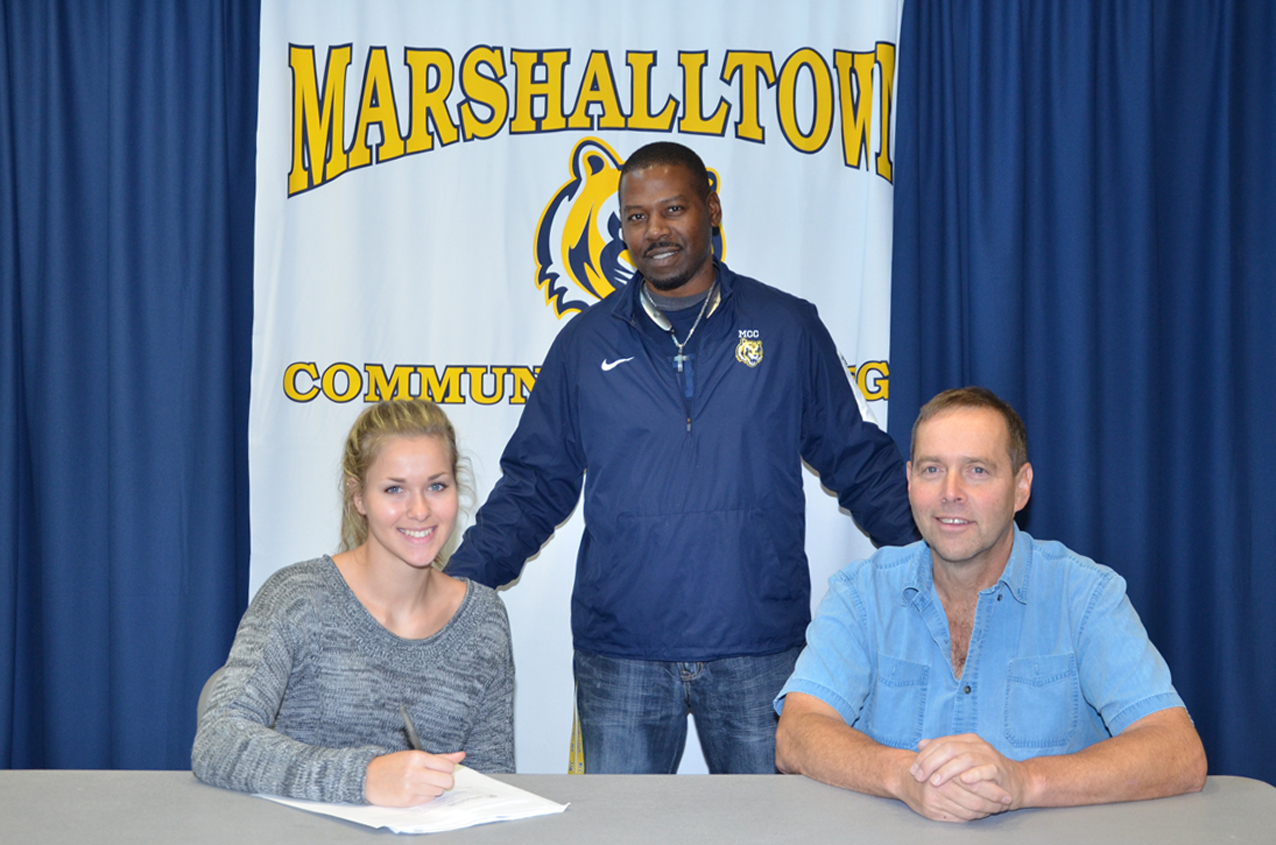 Paige Taylor of British Columbia, pictured with her dad, Gary Taylor, and MCC head coach Garland Shirley, signed her National Letter of Intent to join the MCC Softball team for the 2016 season