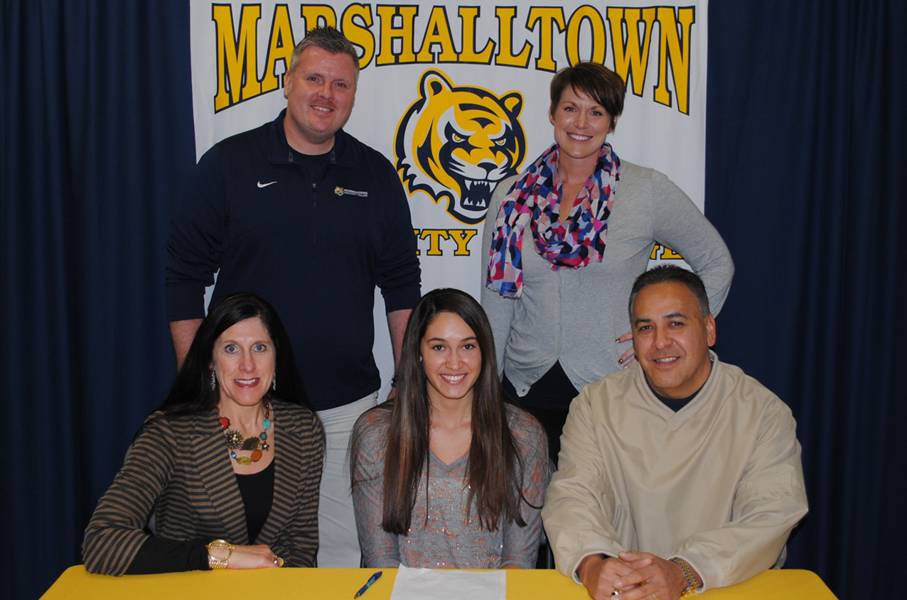 Jade Rohach is joined by her parents along with MCC head coach Chris Brees and Ottawa head coach Melissa Blessington during her National Letter of Intent signing