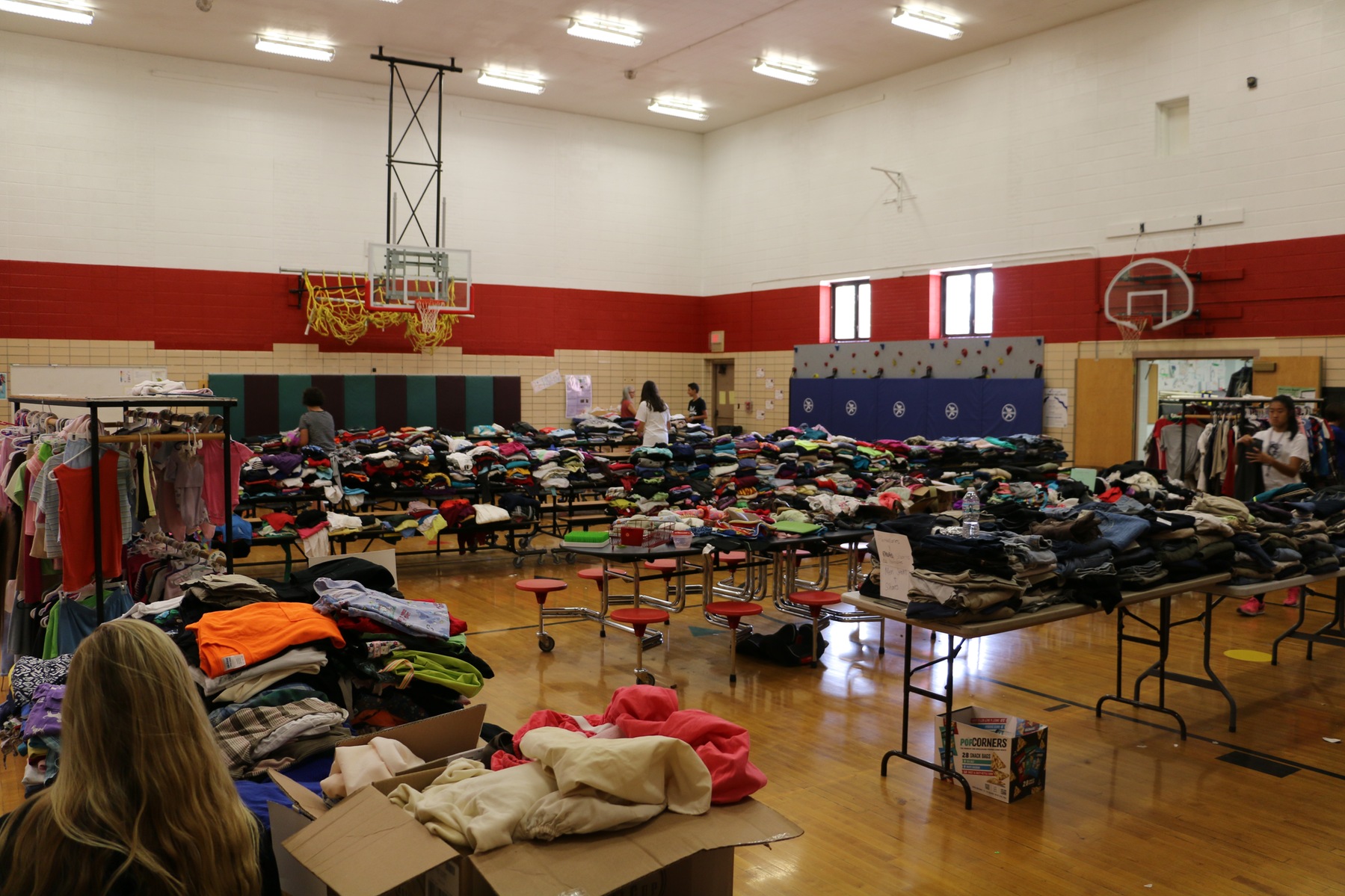 Volleyball Team Assists with Clothing Drive