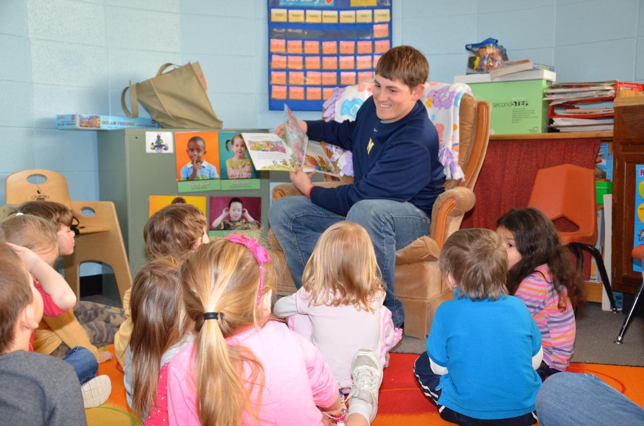Freshman Wesley Warwick read to the children at Tiger Tots on Wednesday morning