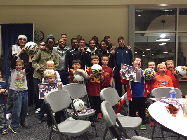 Men's basketball hosts birthday party in Tiger Room