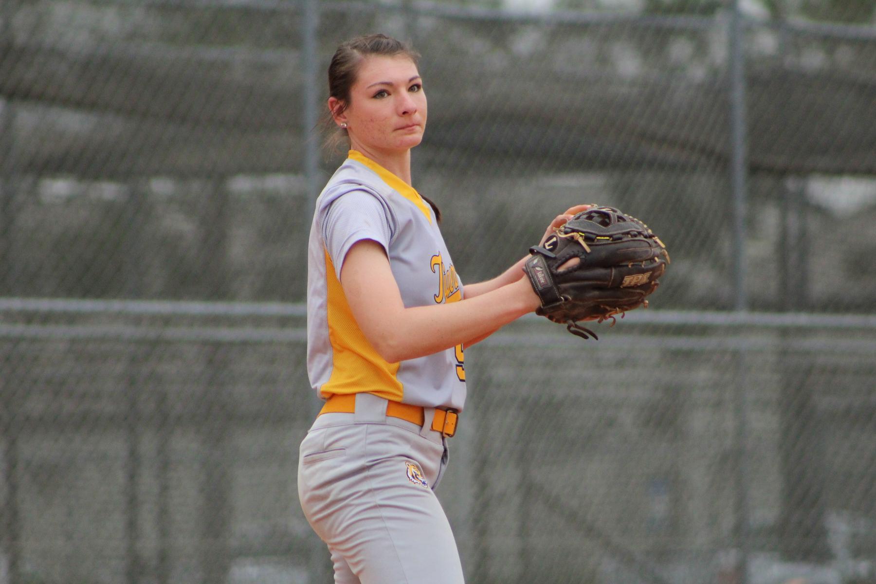 Carter, Taylor pitch softball to a pair of wins