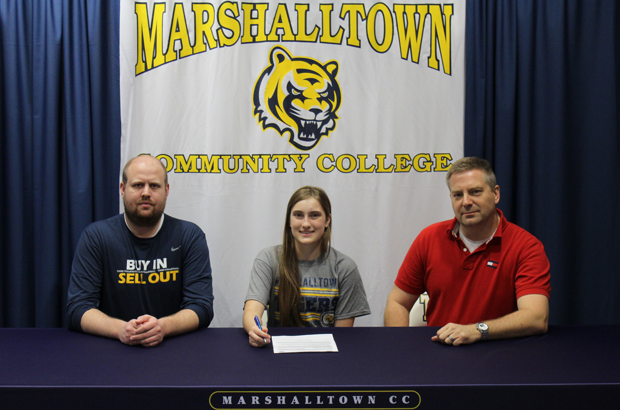 Kierstin Rosipal, flanked by MCC head volleyball coach Justin Hoskins and her father, Chris Rosipal, signed a National Letter of Intent to join the Tigers on Tuesday afternoon
